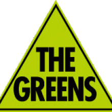 green triangle with the words "The Greens" written across it