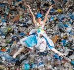 Dancer Lynne Neuman covered in plastic garbage