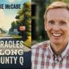 Mike McCabe and the cover of his book, Miracles Along County Q