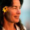 photo of Joanne Rand with a flower in her hair